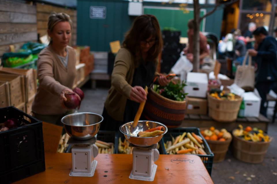 Members weighing up their vegetables