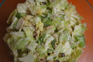 Waldorf Cabbage Slaw with apples and celery is my favorite cabbage recipe. It makes a ton- it's my favorite potluck dish.